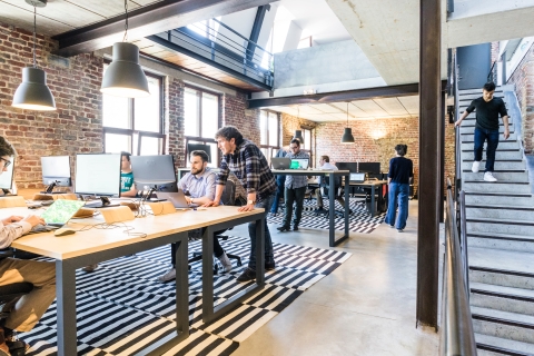 Open floorplan office and employees working